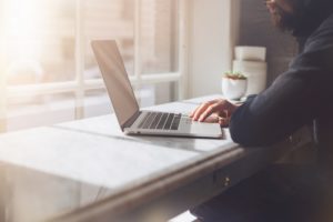 man using laptop