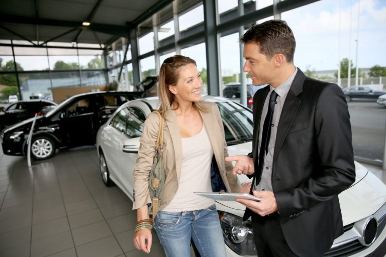 a sales agent and a car buyer